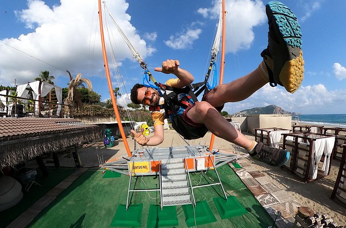 Adrenaline is at its peak with the human slingshot - The launch: screams, laughter, and that beach-to-sky feeling