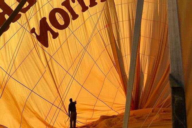 Affordable Hot Air Balloon Ride Over Cat Valley with Hotel Pick-up & Drop-Off - Cat Valley sunrise views: fairy chimneys, rock formations, and the reality of balloon density