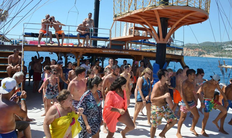 Alanya: Catamaran Boat Trip with Swim Stops and Sunbathing - Ulas Beach: The Relaxing Break Between the Scenic Passes