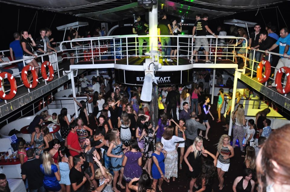 Alanya: Disco Boat Tour with Foam Party and Unlimited Drinks - Caves, coves, and beach time: how swim stops fit into the day