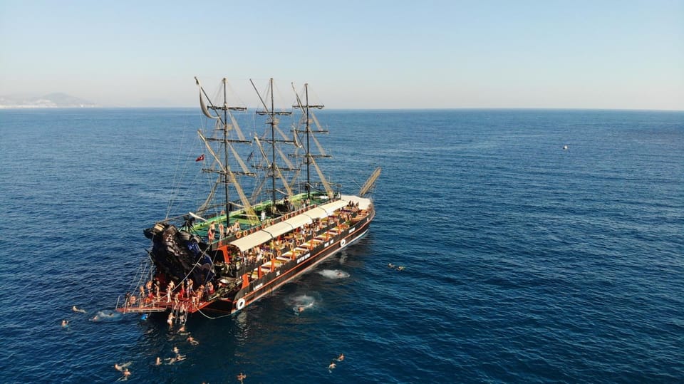 Alanya: Pirate Boat Trip with Optional Pick Up and Lunch - Views from the deck: cliffs, beaches, and turquoise water moments