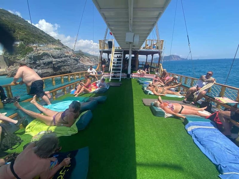 Alanya: Relaxing Boat Tour w/ Lunch, Without Foam Loud Music - Fishing break and on-board add-ons (photos and souvenirs)