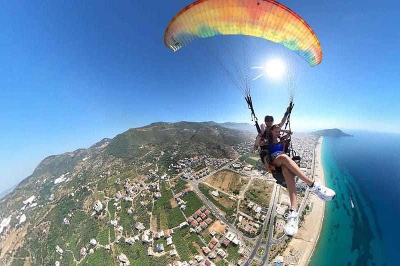 Alanya: Tandem Paragliding SkyDiving With Pick-up & Drop-off - Getting Set Up: Meeting Point, Separate Entrance, and Gear Fit