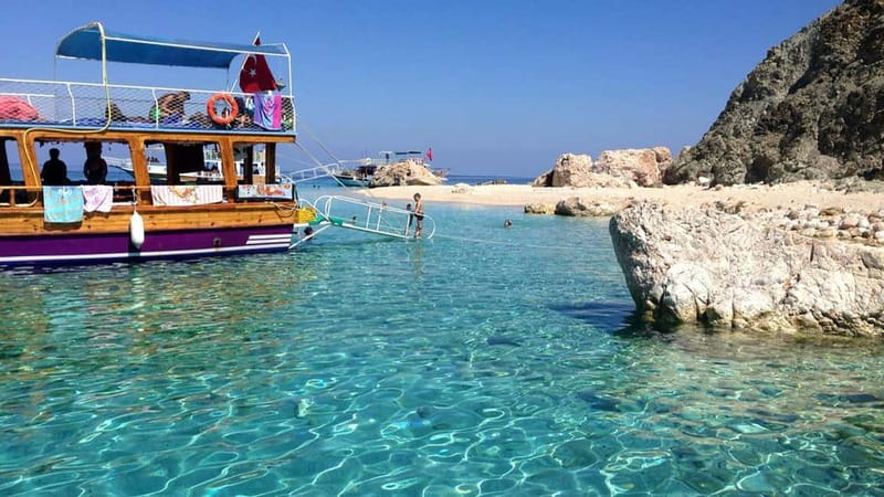 Antalya/Kemer: Adrasan Suluada Island Boat Tours with Lunch - Lunch on board: fish, pasta, salad, and the drink gap