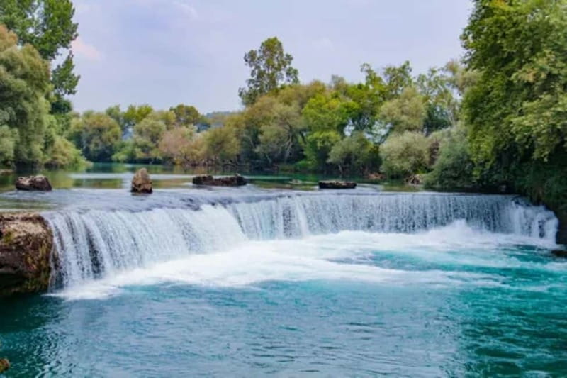 Antalya & Side: Manavgat River Cruise, Waterfall & Bazaar - Swimming where river meets sea: fun, but treat it like a beach day