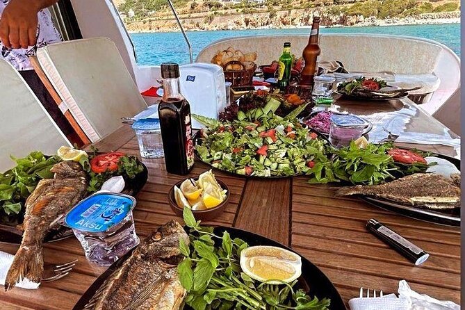 Bodrum Private Motor-Yacht Sunset Tour With Dinner For 3 Hour - Onboard dinner: fish, chicken, or vegetarian plus soft drinks
