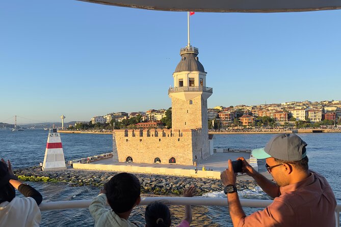 Bosphorus Daytime or Sunset Sightseeing Cruise & Audio Guide - Bosphorus Bridge and Fatih Sultan Mehmet Bridge: modern icons in a historic corridor