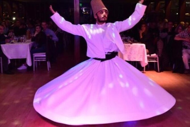 Bosphorus Dinner Cruise & Live Show – Private Table - Dolmabahçe Palace to Beşiktaş: the European-side highlights at night
