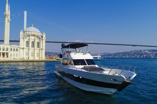 Bosphorus Night Cruise on the Luxury Yacht - Bosphorus Bridge and Fatih Sultan Mehmet Bridge: two silhouettes, two eras