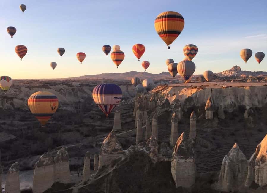 Cappadocia: Sunrise Hot Air Balloon Flight - Waiting at the Launch Field: Inflation, Photos, and Permission to Fly