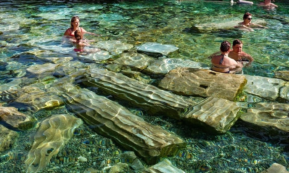 Daily Pamukkale tour from Istanbul (by plane) - Transportation puzzle pieces: van rides and a black cab