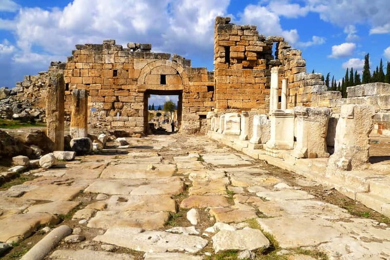 Fethiye: Pamukkale Hot Spring & Hierapolis Small-Group Tour - Hierapolis ruins: amphitheater scale, Roman bath details, and St. Philippe