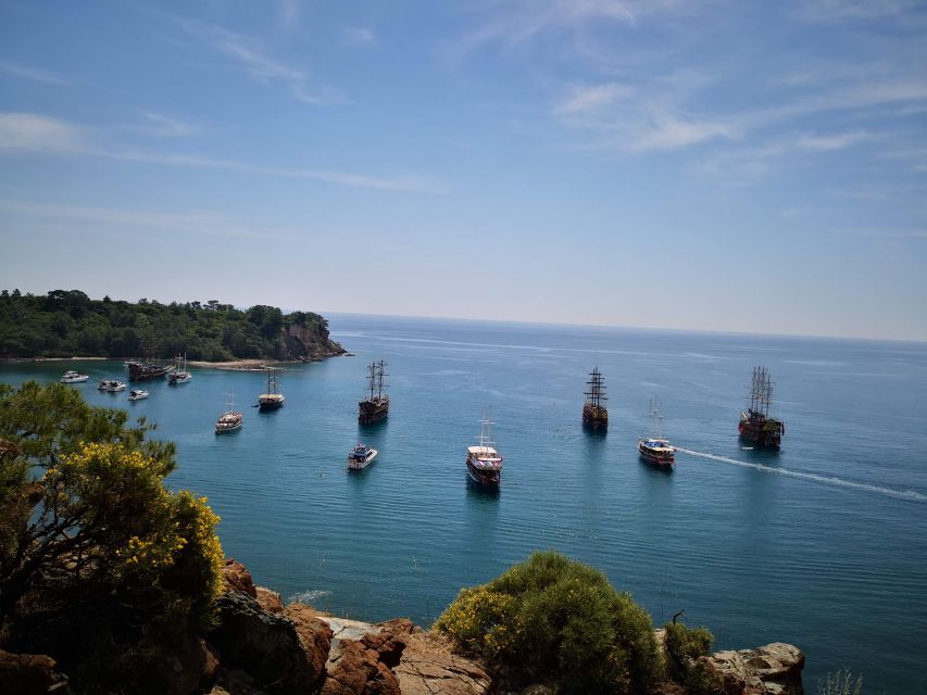 From Antalya: Kemer Pirate Boat Tour with Foam Party & Swim - Cennet and Aquarium coves: turquoise water breaks that feel like the point