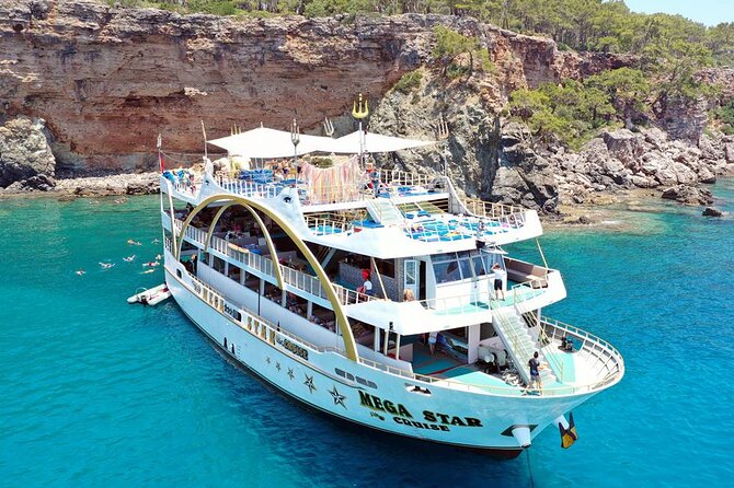 From Antalya To Kemer Mega Star Boat Trip w/Free Transfer - Boarding the Mega Star: comfort, shade, and crew energy