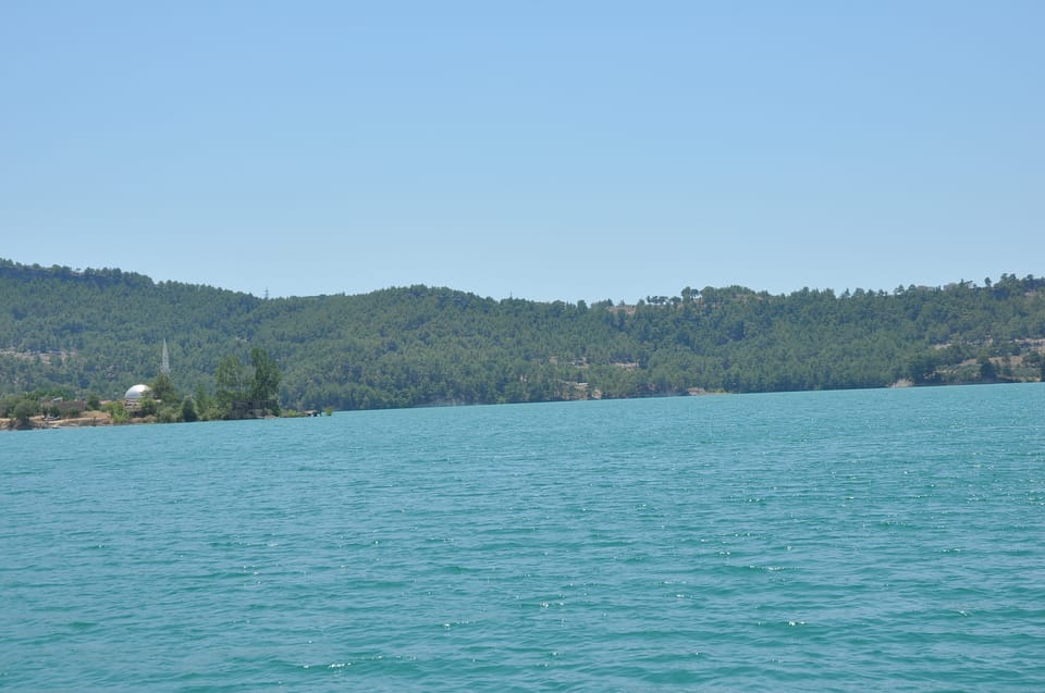From City of Side: Cabrio Bus Safari & Boat Tour with Lunch - Green Lake Lunch + Boat Ride: The Calm Middle of the Day