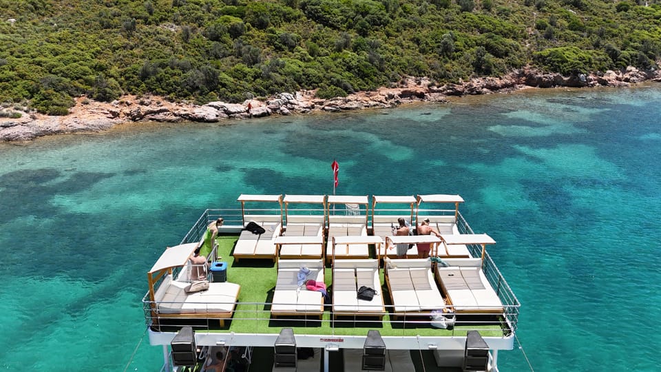 From Izmir: Full Day Boat Trip around Cesme with BBQ Lunch - First moments on the boat: seating, sun comfort, and the onboard vibe