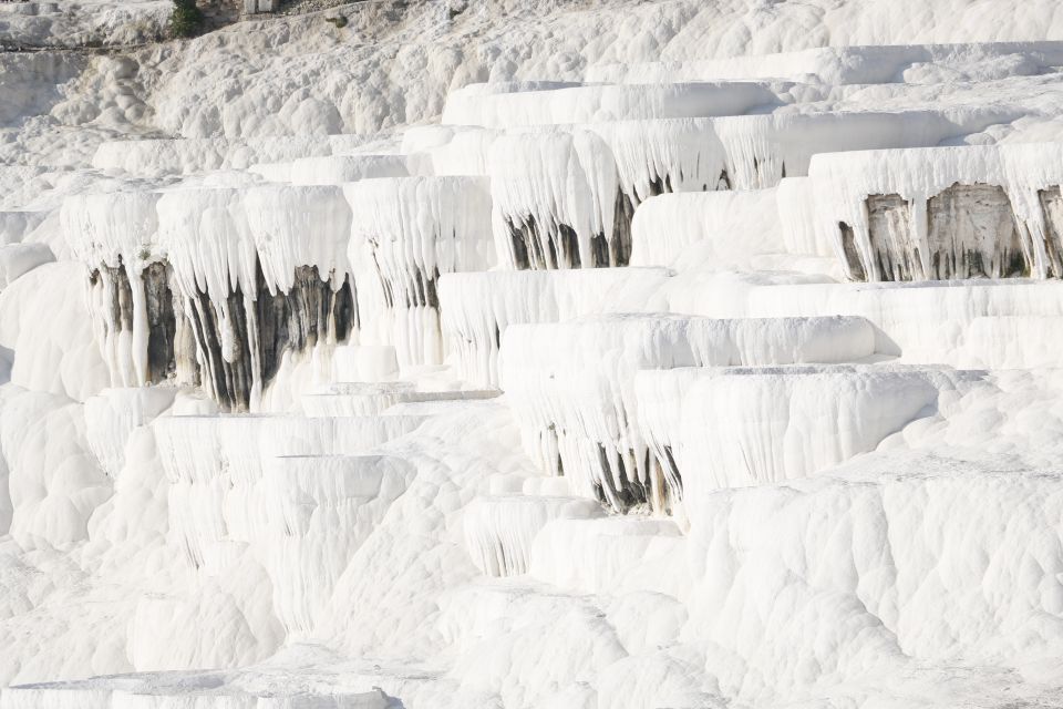 From Izmir: Pamukkale Day Trip with Lunch - Hierapolis ruins with a guide: Domitian Gate to Apollon Temple