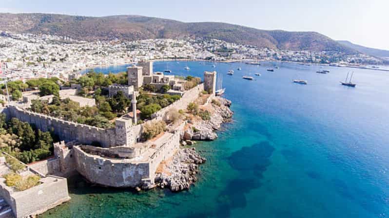 From Kos: Oriental Bus Tour Bodrum w/Roundtrip Ferry&Pickup - Arrival in Bodrum: From Halicarnassus Port to a Guided Bus Tour