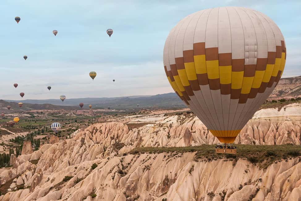 Göreme: Sunrise Hot Air Balloon Ride over Cappadocia - Getting There: Hotel Pickup, Breakfast, and the Launch Area Morning