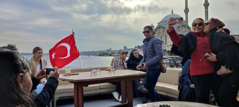 Istanbul: Bosphorus Sunset Cruise on Yacht with Live Guide - Ortaköy Mosque and the Bosphorus Bridge: iconic views with a built-in photo rhythm