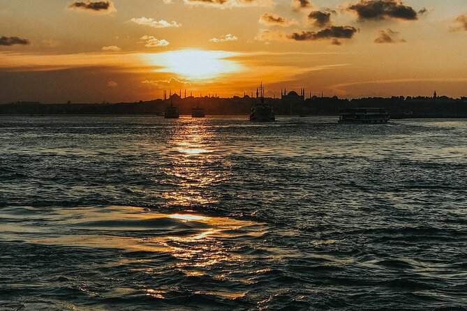 Istanbul Private Yacht Sunset Tour - 2 Hours - Galata Bridge: Fishermen, food smells, and the Golden Horn view