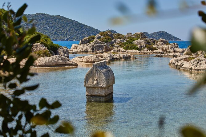 Kekova Sunken City Full Day Boat Trip - Pirate Cave pass-by: dramatic rocks, but no stop
