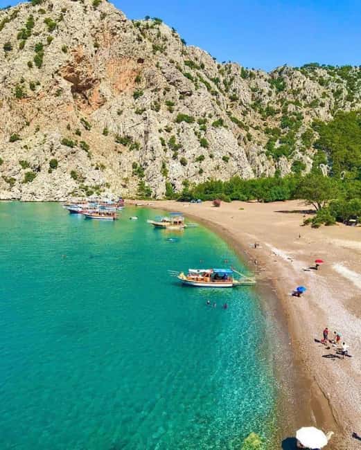 Kemer Porto Genoese-Sazak Bays Boat Trip With Mud Baths - Porto Genoese Bay: Ancient Sea Views Without the Museum Time