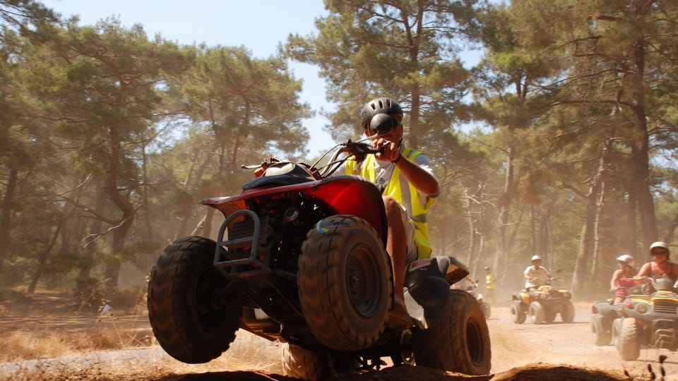 Kemer: Quad Safari Experience - Camyuva quad safari: rocks, mud, and shallow water crossings