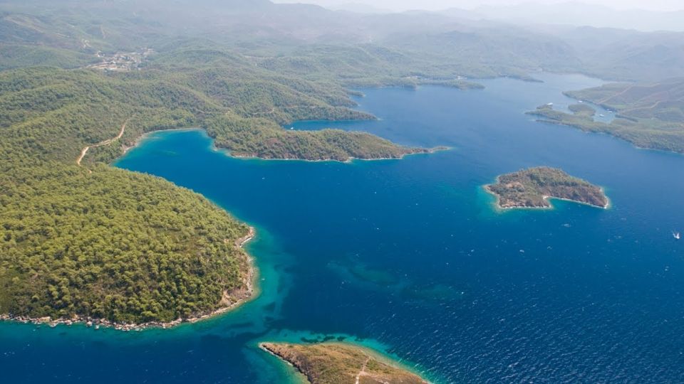 Marmaris: Cleopatra Island Boat Trip with Lunch and Transfer - From Marmaris pickup to a wooden-boat day on the water