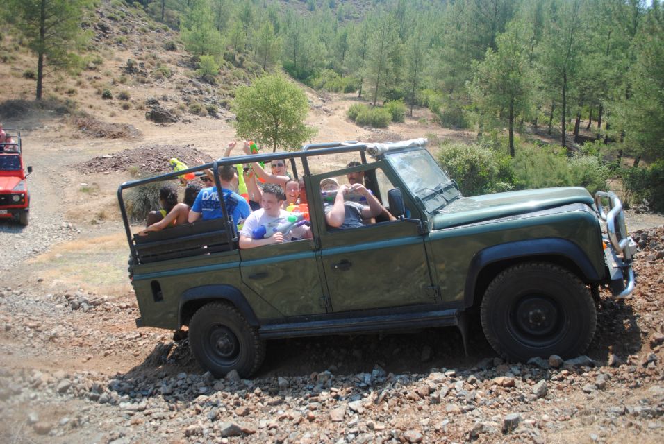Marmaris Jeep Safari Water Fight, Colour and Foam Party - Marmaris Turgut Waterfalls: Cold Swim, Lunch, and Being Careful on Slippery Rocks