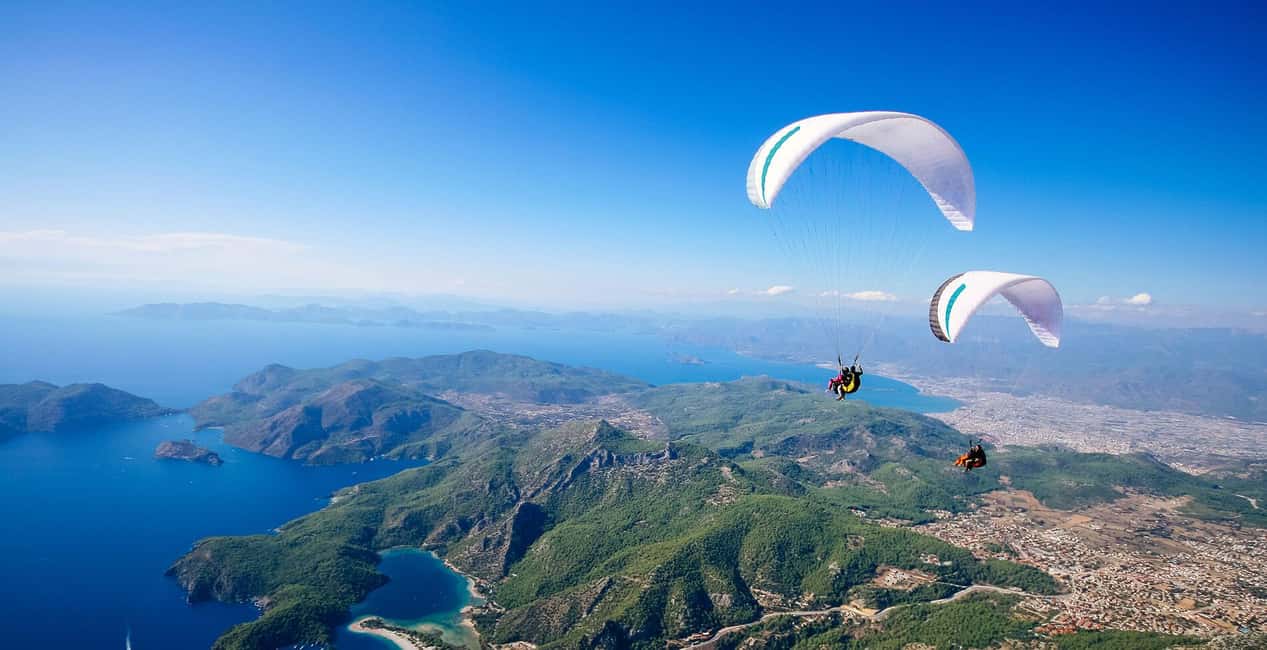 Ölüdeniz: Fethiye Tandem Paragliding w/ Hotel Pickup - From hotel pickup to Babadağ: how the day starts