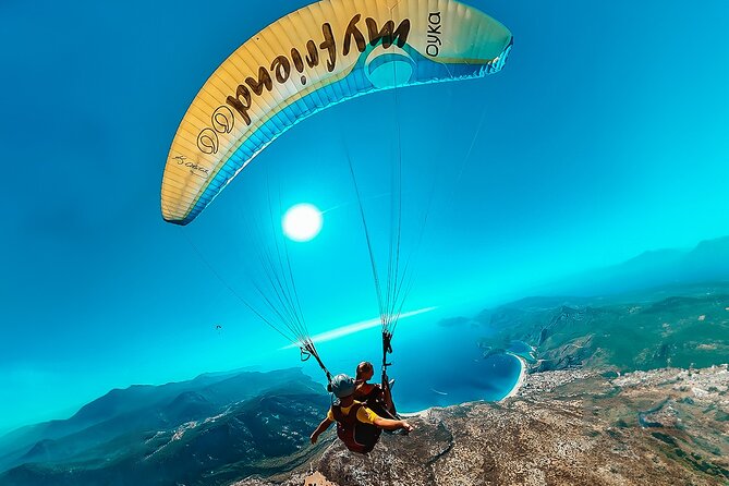 Oludeniz Paragliding in Fethiye Turkey - Strapped In: Tandem Harness, Pilot Control, and Optional Acrobatics