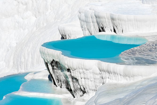 Pamukkale and Hierapolis Daily Tour From Antalya - Hierapolis and Pamukkale: Roman Theater to White Terraces