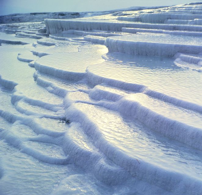 Pamukkale and Hierapolis Full-Day Guided Tour - Hierapolis Sacred City ruins: Domitian Gate, colonnaded street, cathedral