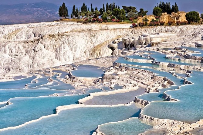 Pamukkale, Cleopatra’s pool, Hieropolis from Antalya with lunch - Stop 1: Pamukkale Natural Park, travertines, and the Hierapolis open-air museum