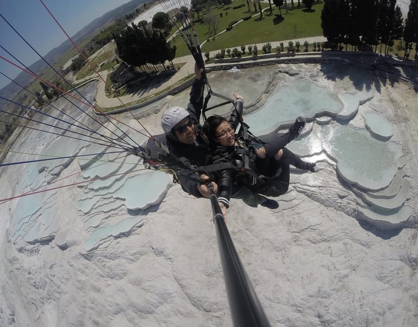 Pamukkale: Tandem Paragliding with Ancient Hierapolis Views - Over Pamukkale: Cotton Castle, Ruins, and Thermal Springs From the Air