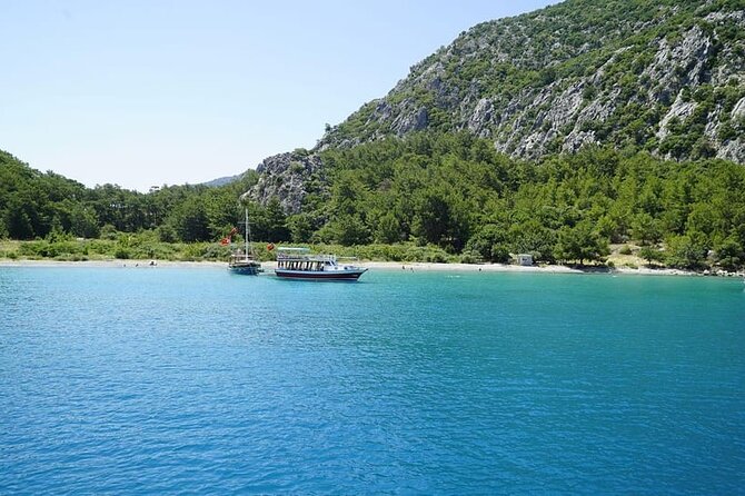 Porto Genoese Boat Trip With Mud Baths From Kemer - Porto Ceneviz Koyu: cruising the Genoese fortress above the cliffs