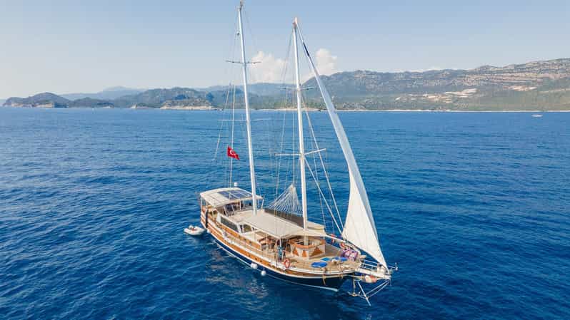 Sail Turkey: Gulet Cruise Olympos to Fethiye - Day 3: Butterfly Valley, Oludeniz Blue Lagoon Swim, Baba Dag Paragliding Option, St Nicholas Island Sunset