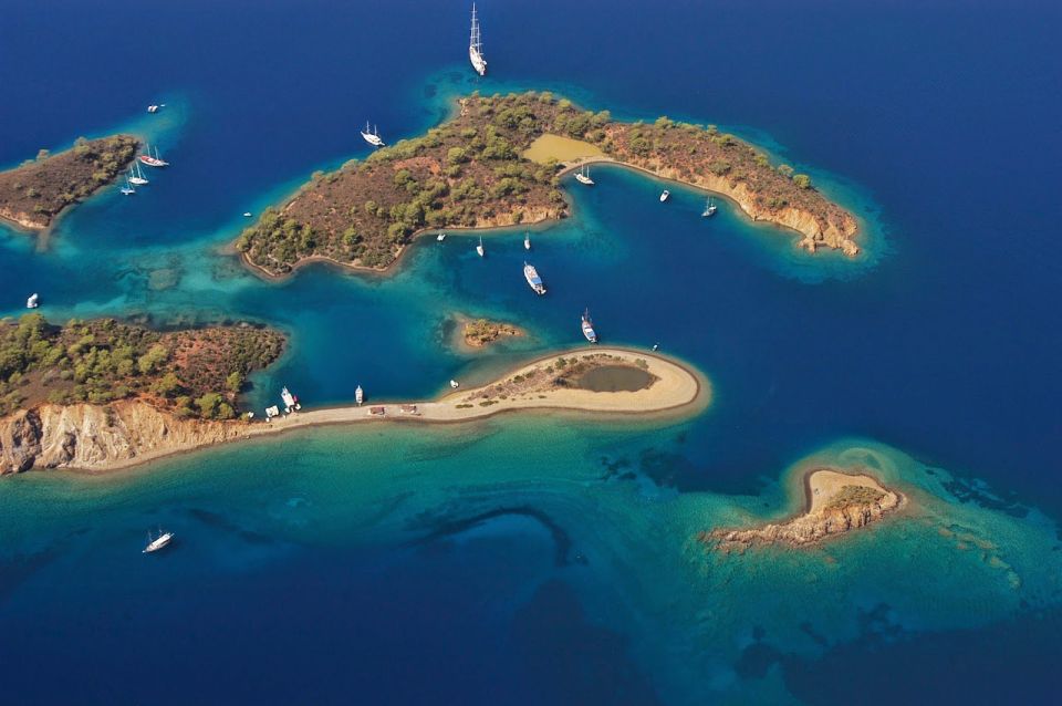 Sarigerme: 12 Islands Boat Trip with Lunch and Transfer - From Cleopatra Bath ruins to Yassica islands: history you can see up close
