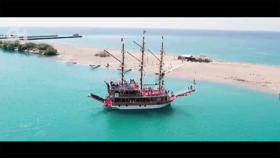 Side: Dolphin Island Boat Tour : A Seaside Adventure - What the boat experience feels like (music, photos, and onboard selling)