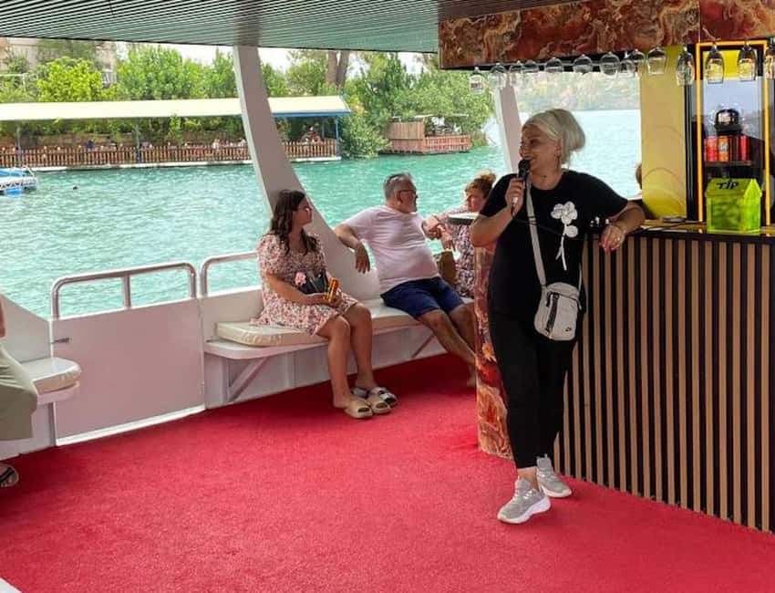 Side: Guided Tour and Electric Catamaran Cruise, Waterfall - Orange groves and a village house: where the day turns local