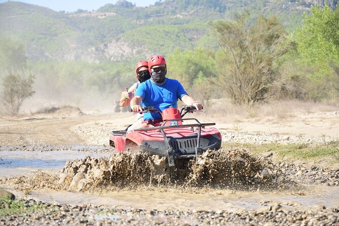Side; The Best Quat Safari in Taurus Mountain - The Ride Details: Trails, Mud, Streams, and the Lake Stop